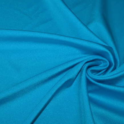 Tessuto in lycra lucida color turchese ideale per cucire un costume da bagno fai da te.