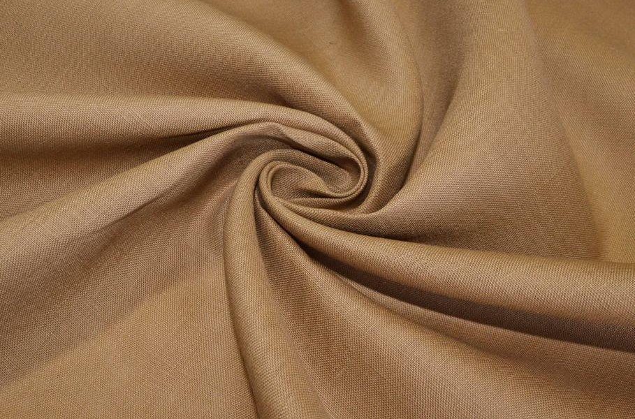 Tessuto in puro lino colore beige naturale, ideale per creare una borsa mare fai da te resistente.